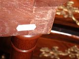a piece of wood on the top of a wooden table