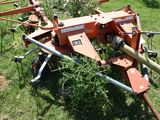 a small machine that is sitting in the grass