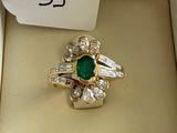 a ring in a box with a price tag on it