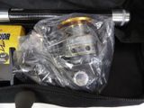 a picture of a fishing rod and reel in a bag