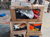 a stack of boxes with a hat on top of it