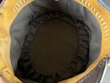 a close up of a pair of shoes with a hat on