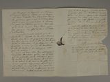 an old manuscript with a piece of paper on it