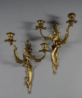 pair of antique brass wall sconces with flowers and leaves