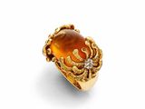 une bague en or jaune sertie d'une pierre orange et de diamants