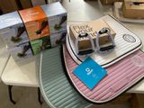 several boxes of food are sitting on a table next to boxes of food