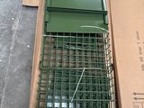 a bird cage that is sitting on top of a cardboard box