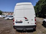 a white van that is parked in a parking lot