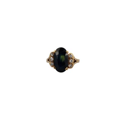 a close up of a ring on a white background