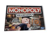 jeu de société « Monopoly » représentant un homme tenant une loupe, une loupe, une loupe, une loupe, une loupe, une loupe, une loupe, une loupe