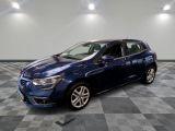 a blue car is parked in a room with a checkered floor