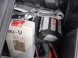 an image of a car ' s interior with tools in it