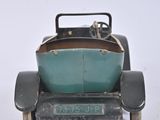 a toy car that is sitting on a white surface