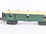 a toy train that is sitting next to other toy trains