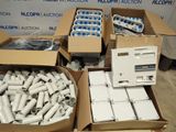 several boxes of electrical equipment are stacked on top of each other