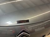 an image of a car with a sticker on the hood