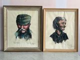 deux tableaux encadrés représentant des hommes portant un chapeau et une barbe, assis à une table
