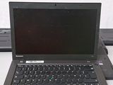 two laptops that are sitting on a table