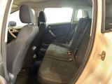 the back seat of a car with a seat belt in it
