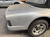 an image of a car that is parked in a garage