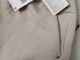 the back of a pair of nike pants with a tag on it