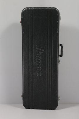 a black suitcase that is sitting on a table