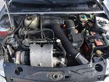 a car engine with its hood open on the street