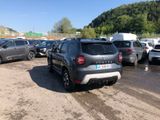 a lot of cars parked in a parking lot