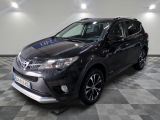 the toyota rav is parked on a checkered floor