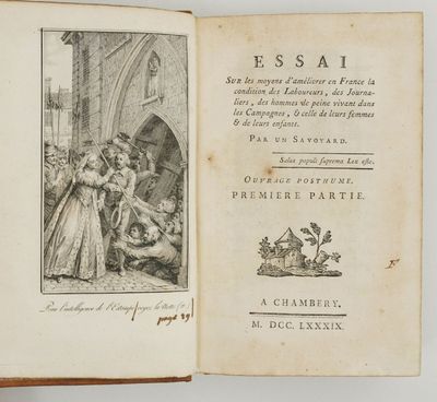 un livre ouvert sur lequel figure le dessin d'une femme en robe et d'un homme en robe