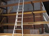 a ladder that is leaning against a wall in a building