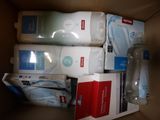 a box with a lot of toiletries and a bottle of lotion