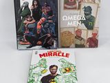 three comic books on a white surface with a white background