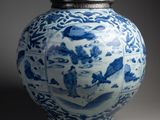blue and white porcelain jar with lid with birds and flowers on it