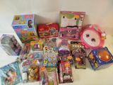 a lot of toys that are sitting on a bed