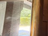 a mirror hanging on a wall in a room