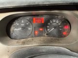a close up of a car dashboard with a speedometer