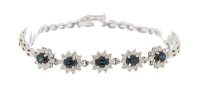 an image of a bracelet with blue and white stones