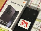 a box of redmi note 11 next to a box of redmi note 11
