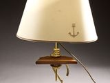 an image of a lamp with a rope and a lamp shade on top of it