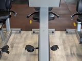 an image of a gym room with exercise equipment