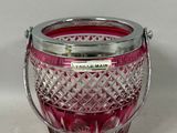 purple glass ice bucket with handle on white background