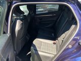 the back seat of a car with the back door open