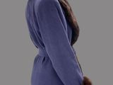 an image of a woman ' s coat with fur collar and cuffs
