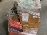 a pile of boxes that are sitting on a pallet in a warehouse