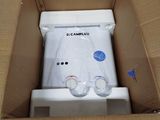 a white toilet in a cardboard box that is open