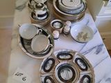 a table with a lot of plates and bowls on it