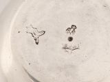 a white plate with a picture of a dog and a cat on it