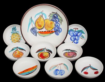 six bowls and a plate with fruit designs on them