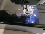 a sewing machine that is sitting on a table